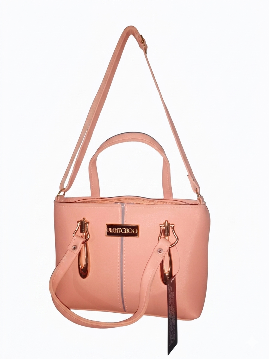 "elegant pink handheld bag with gold accents" "elegant pink handheld bag with gold accents"