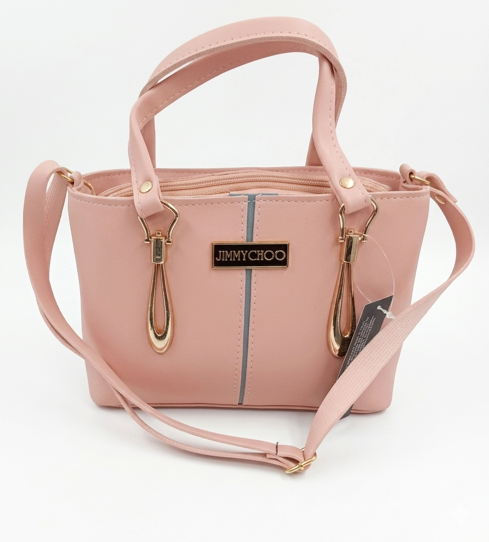 "elegant pink handheld bag with gold accents" "elegant pink handheld bag with gold accents"